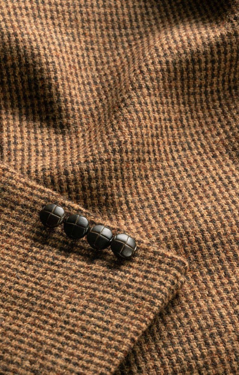 A beautiful tweed jacket with wodden buttons